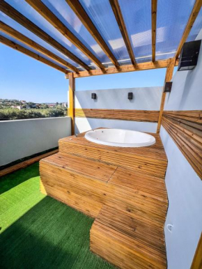 Casa Bela Vista com Jacuzzi, Ar e Vista Paradisíaca na Praia do Rosa